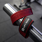 Red lifting strap with 'B Lift Basic' label on a metal bar